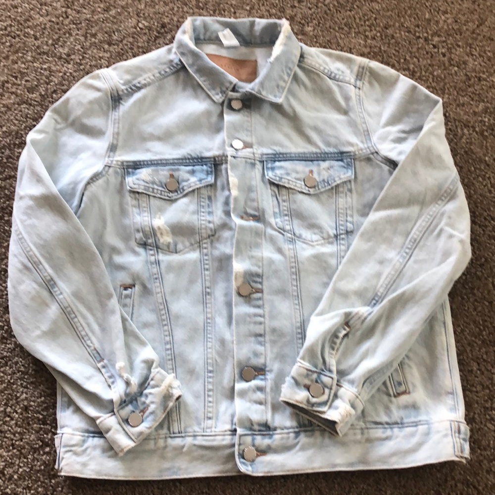 Denim jacket , new , without tag , size US 10 .